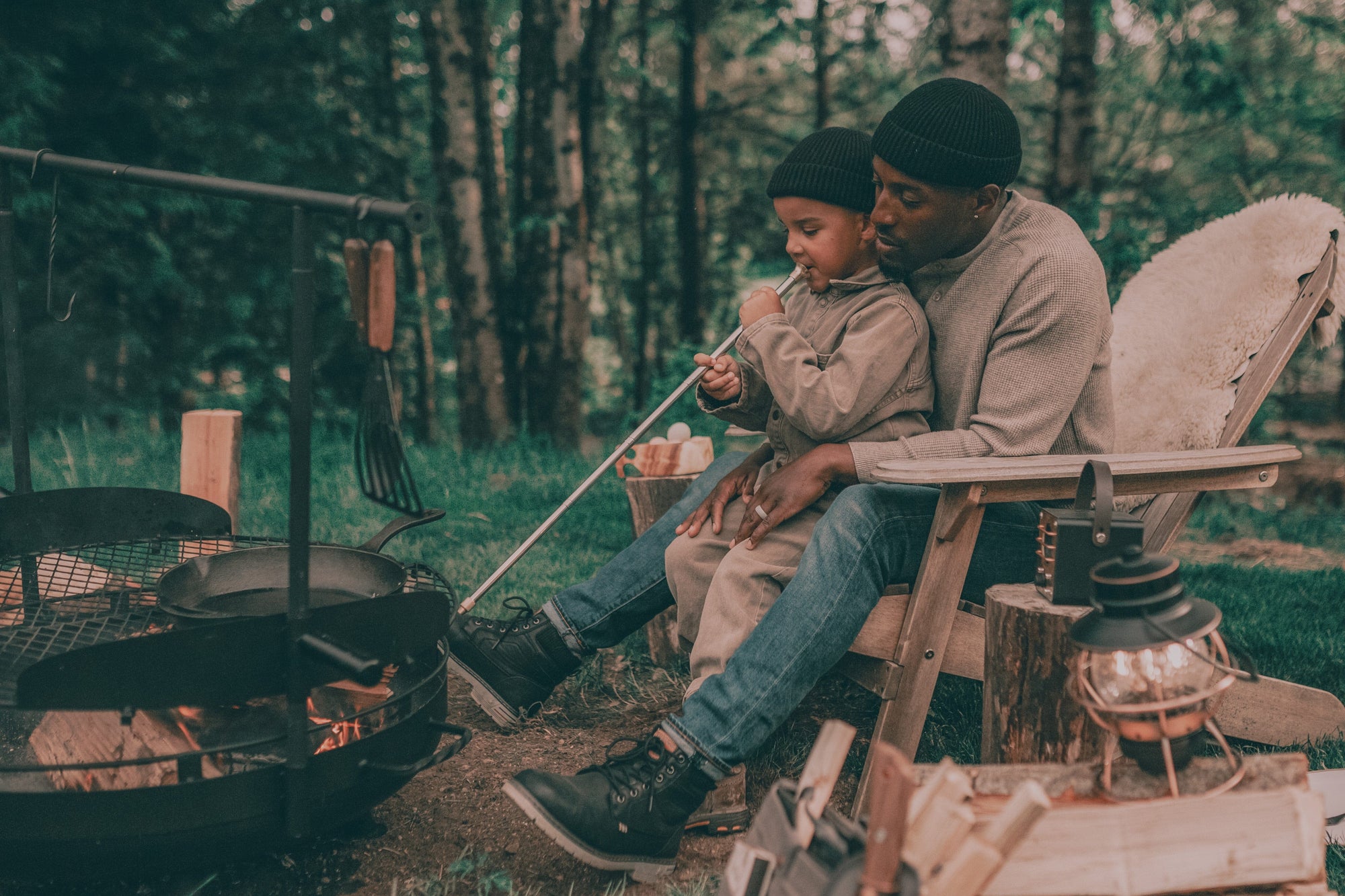 Father and son by the fire